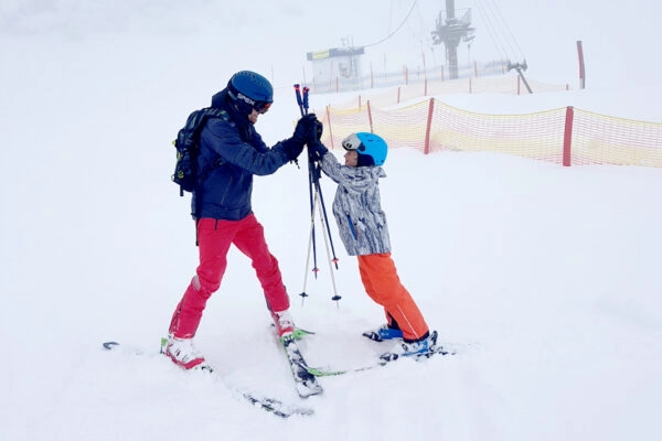wintersport met kinderen blij